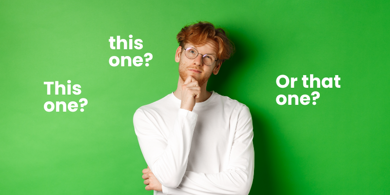 A young man contemplating about which home service provider to choose.