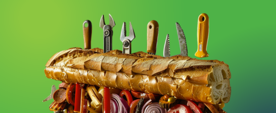 A whimsical sandwich filled with garden tools and hardware instead of traditional ingredients, symbolizing a blend of nourishment from industry knowledge served alongside a meal.